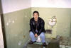 Me sitting on the toilet in one of the cells in Alcatraz